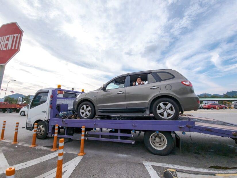 Vehicle Being Repossessed With A Person Still Inside